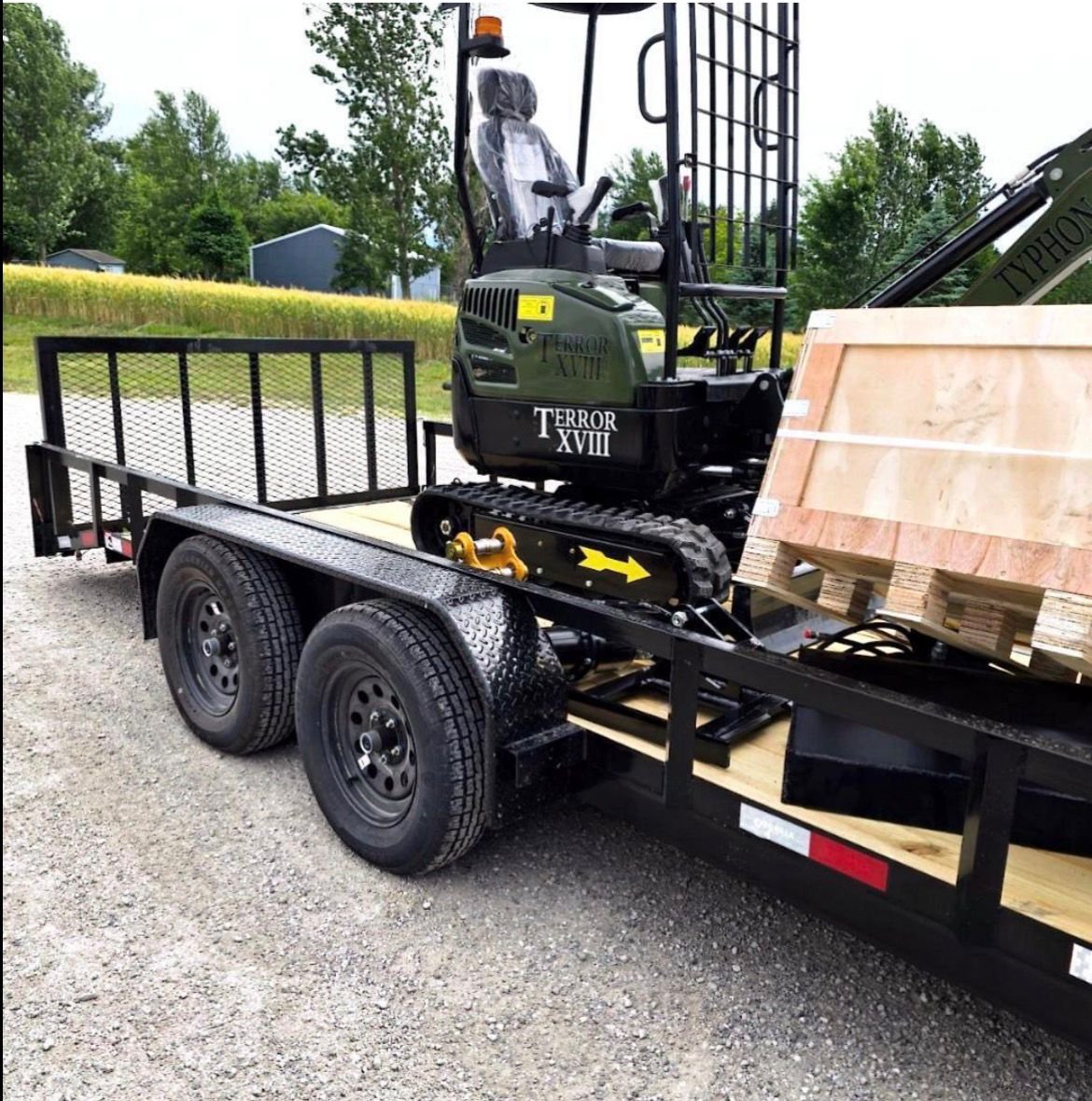 TYPHON TERROR XX mini excavator secured on a utility trailer